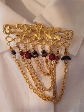 Gold-Tone Multi-Dangle Brooch with Red and Blue Accents